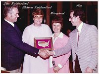 Jim and Sharon Rutherford, with Margaret and Jim Steele at an Amway convention.  Wonder which one is getting the award?